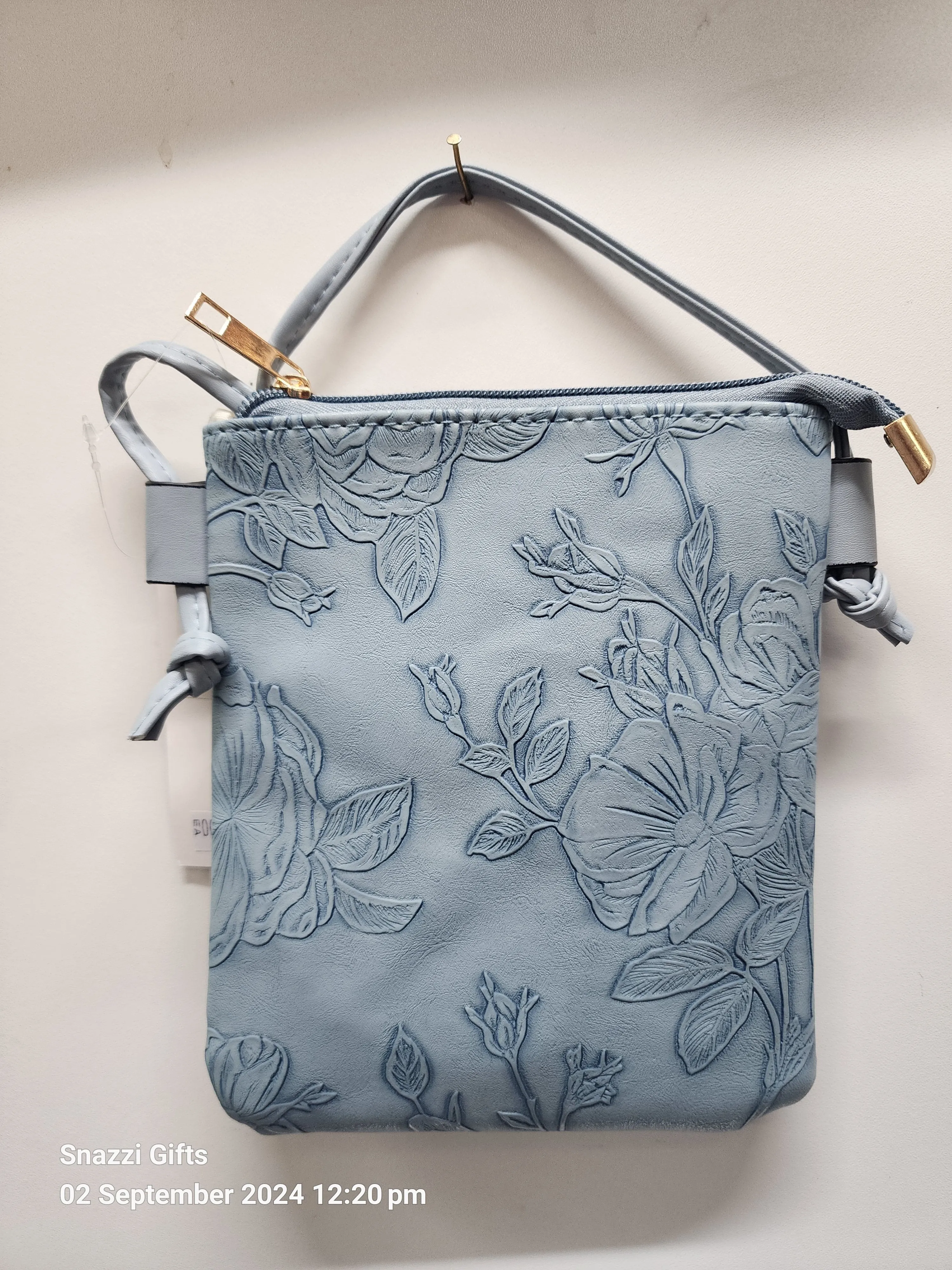 hibiscus emboss phone bag Blue