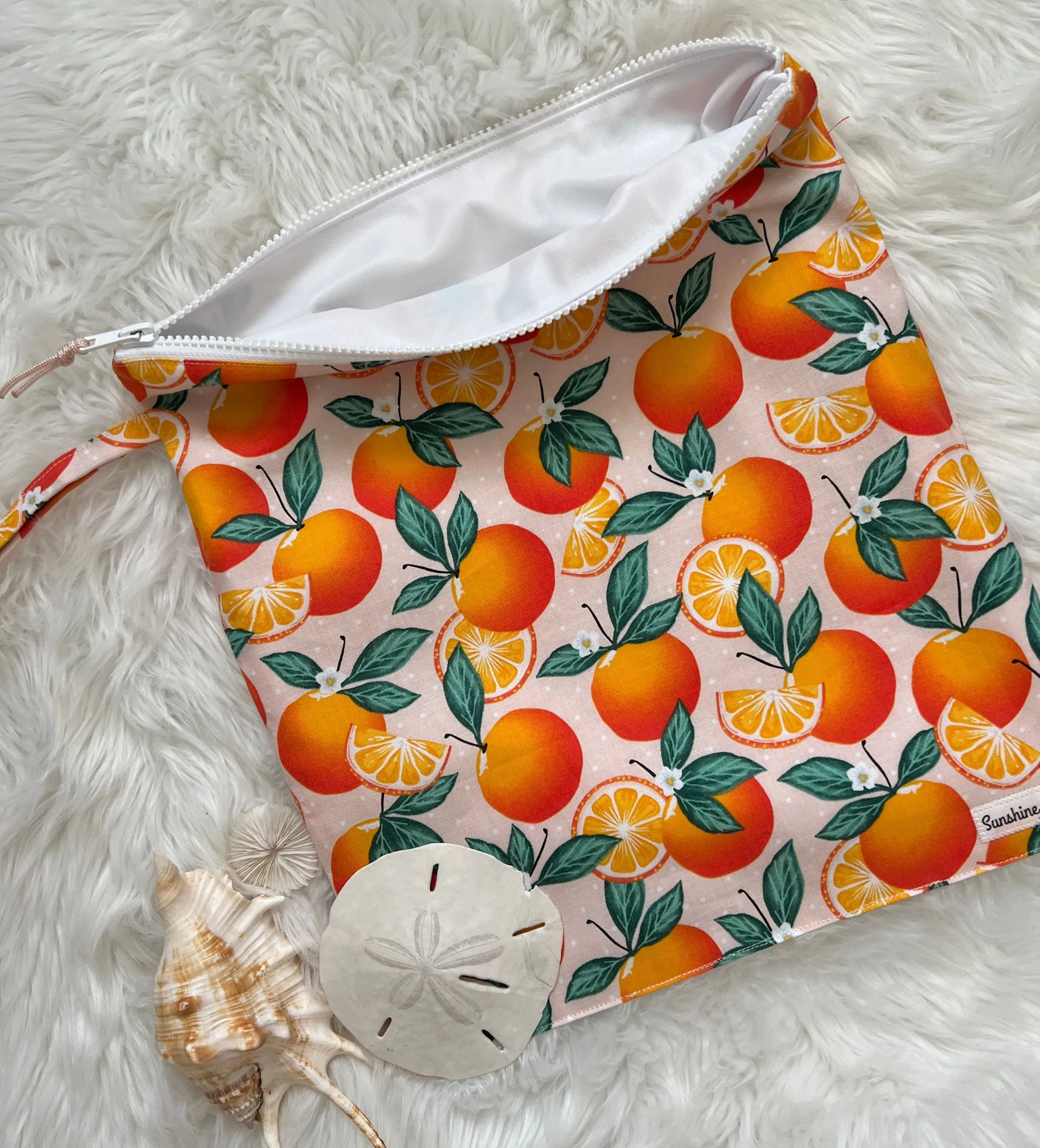 Orange print wet bag, waterproof lined zipper bag