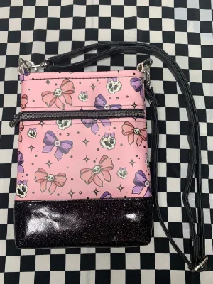 Skulls and bows pink crossbody bag